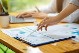 feasibility-study-financial-projection Financial expert preparing feasibility projection report for business expansion